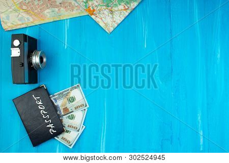 The Concept Of Travel And Recreation. Amera, Maps Geographic, Passport, Money, Bag, Glasses, Sunscre
