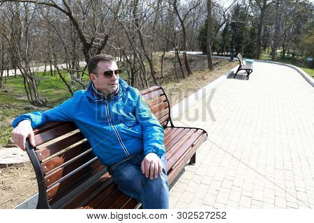 Man Sitting On Bench In Spring, Malakhov Kurgan, Sevastopol