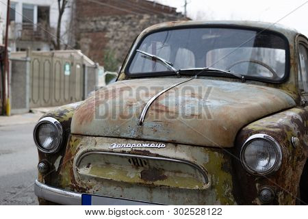 Kutaisi, Georgia - 14 March, 2019: Retro Rusty Car Zaporozhets Zaz 965 On The Steet Close-up