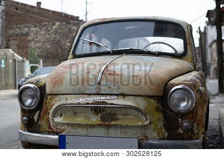 Kutaisi, Georgia - 14 March, 2019: Retro Rusty Car Zaporozhets Zaz 965 On The Steet Close-up