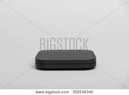 Tv Set-top Box For Ip Tv And Digital Video Content On A Gray Background. Digital Tv On Gray Backgrou