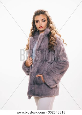 The Key Piece Of Her Closet. Winter Fashion Trends. Young Woman Wear Elegant Winter Coat. Pretty Wom