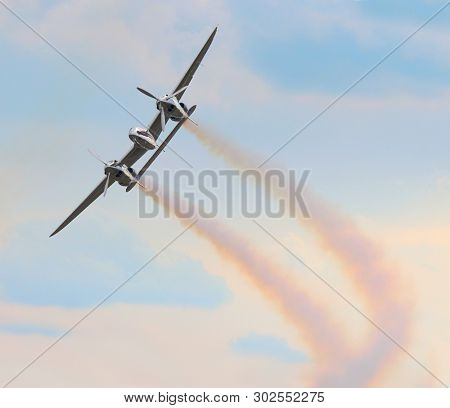 Pilsen / Czech Republic - September 9, 2018: Flying Bulls Red Bull sponsored Lockheed P-38 Lightning. Rare fighter plane over Pilsen.