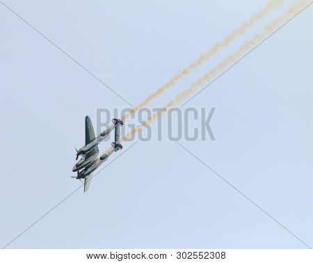 Pilsen / Czech Republic - September 9, 2018: Flying Bulls Red Bull sponsored Lockheed P-38 Lightning. Rare fighter plane over Pilsen.