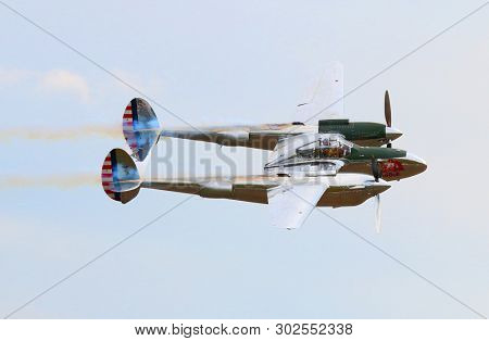Pilsen / Czech Republic - September 9, 2018: Flying Bulls Red Bull sponsored Lockheed P-38 Lightning. Rare fighter plane over Pilsen.
