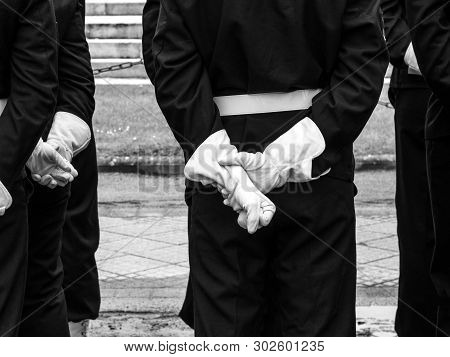 Rear View Of Unrecognizable Sailor Mariner Hands At Ceremony To Mark Western Allies World War Two Vi