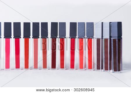 Professional Makeup, Bright Lipstick, Lip Gloss Pink, Red, Burgundy On White Background
