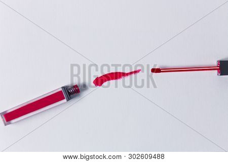 Smudged One Red Lipstick Isolated On White