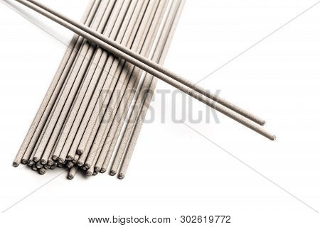 Electrodes For Welding Isolated On A White Background. Accessories Of Welder. - Image