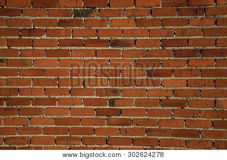 Orange Brick Pattern On House Wall In Tielt. Charming And Quiet Village In The Countryside, Near Ghe