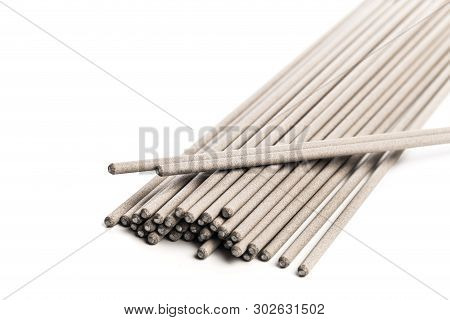 Electrodes For Welding Isolated On A White Background. Accessories Of Welder. - Image