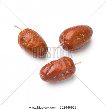 Dried organic fruit of the Oleaster, Silver berry or russian olive close up isolated on white background