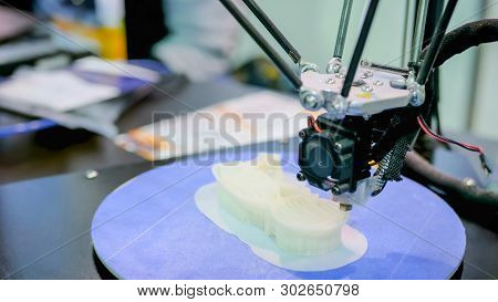 Print Head Of 3d Printer Machine Printing Plastic Model At Modern Scifi Technology Exhibition. 3d Pr