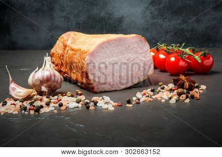 Halh Of Smoked Gammon With Spices, Garlic, And Tomatoes