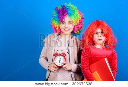 Are We In Time. Adorable Party Goers. Cute Children With Fancy Hair Waiting For Party Time With Cloc