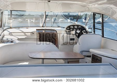 Luxury Yacht Control Wheel And Interior Of A Transport Motorboat