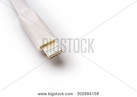 Connector Lightning On A White Background. This Is A Proprietary Connector Used To Connect Mobile De