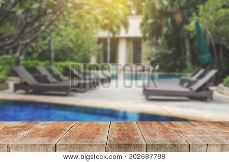 Wood Walk Outdoor In Ground Residential Swimming Pool.