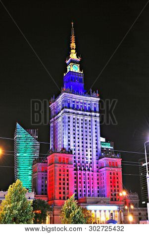 Warsaw, Poland. 16 July 2016. The Palace Of Culture And Science Light Up With The Colors Of The Fren