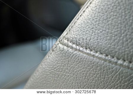 Cars leather interior detail. Car interior at day.