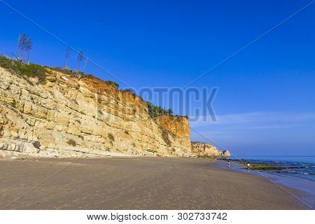 Praia Do Porto De Mos, Long Beach In Lagos, Algarve Region, Portugal. Beautiful Golden Beach, Surrou