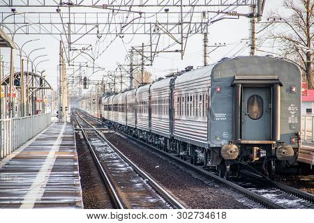 Russian Train. Locomotive With Cars. Passenger Train. . Russia Metallostroy March 8, 2019