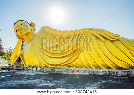 Lying Buddha Statue Made With Blue Sky Background