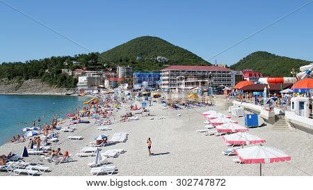 Olginka, Russia - May 24, 2019: Holidaymakers On The Beach, Olginka Village, Tuapse, The Black Sea, 