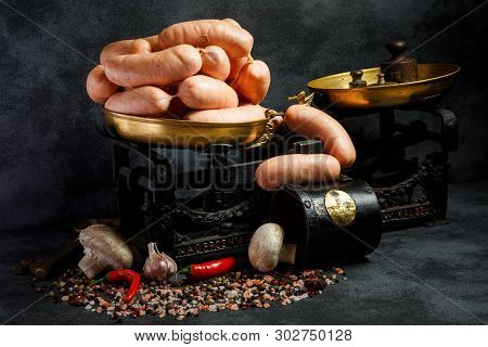 Bunch Of Thick Wieners In Spiral With Chili And Mushrooms