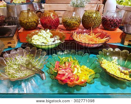 Salad Bar, Fresh Vegetable With Bell Peppers, Carrot, Corn, Lettuce, Cucumber And ยickled Olives In 