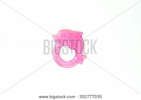 Newbor Pink Toy. A Colorful Baby Rattle On A White Horizontal Background