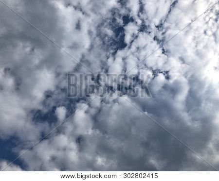 Blue Sky With White Clouds On A Sunny Day