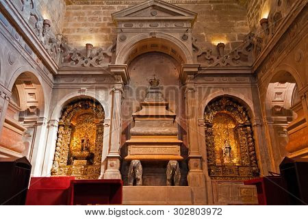 Lisbon, Portugal - June 30, 2018: Tomb of King Dom Henrique I at Jeronimos Monastery or Abbey aka Santa Maria de Belem. UNESCO World Heritage Site. Manuelino or Manueline art.