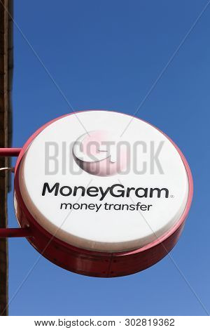 Horsens, Denmark - April 2, 2018: Moneygram Logo On A Wall. Moneygram International Inc. Is A Money 