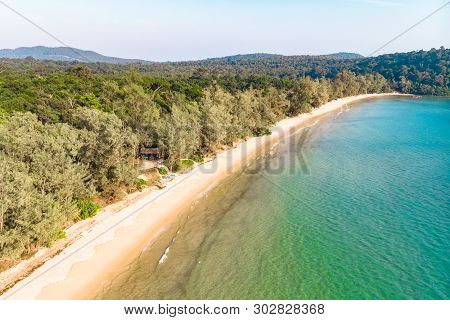Coast Of Island Koh Rong Samloem, Cambodia. Long Deserted Beach With White Sand And Clear Water. Aer