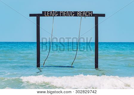 Swing On The Tropical Island Of Koh Rong Samloem In Cambodia. Exotic Tropical Paradise Swings Over C
