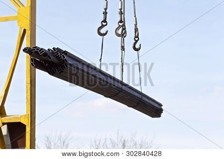 Loading A Pack Of A Rectangular Pipe In A Warehouse, Russia