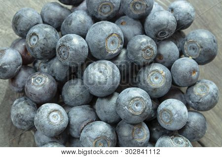 A Handful Of Blueberries Are Large Berries Of Dark Blue, Natural Forest Garden Blueberries Without P