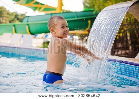 Child Sports In A Childrens Outdoor Pool