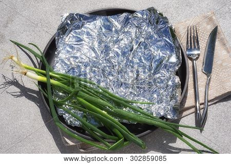 Template With Empty Space For Advertising Design. Round Tray Plate With Green Onion And Foil Served 