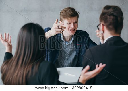 Failed Job Interview. Human Resources. Short Tempered Applicant Yelling At Hr Managers, Pressing His