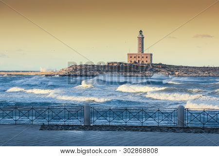 The Lighthouse Of Vieste, Rises On The Isle Of Santa Eufemia. Lighthouse In Vieste, Gargano Peninsul