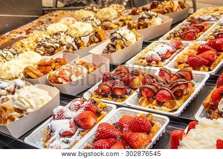 Showcase With Traditional Belgian Waffels In Bruges, Belgian, Europe