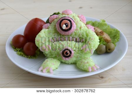 The Homemade Monster Is Made Of Rice. Kyaraben, Bento. Creative Food For Children.
