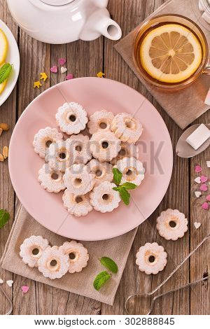 Canestrelli Biscuits With Mint On White Dish.