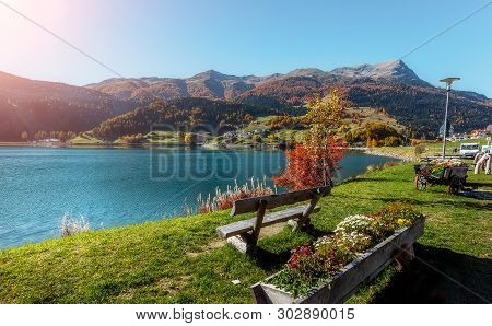 Impressive View Of Resia Village With Perfect Sky. Impressively Beautiful Autumn Of Italian Alps And