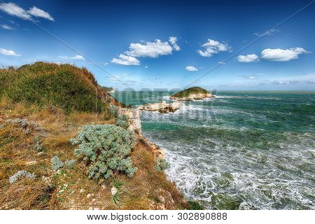 Above The Cliffs At The Coastline Of Vieste. Summer Rocky Sea Coast Baia Di Campi Vieste On The Garg