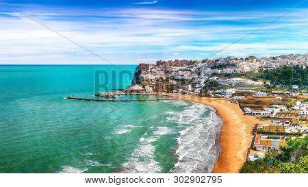Picturesque Peschici With Wide Sandy Beach In Puglia, Adriatic Coast Of Italy. Location Peschici, Ga