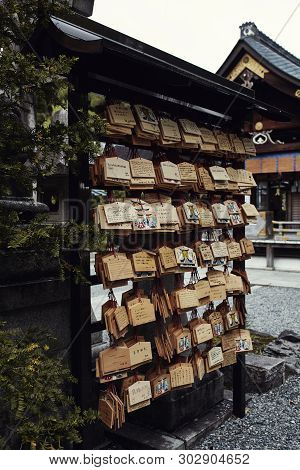Kyoto, Japan - April 16th, 2018: A Display Of Ema Plaques, Wood Wishing Plaques, At The Fushimi Inar