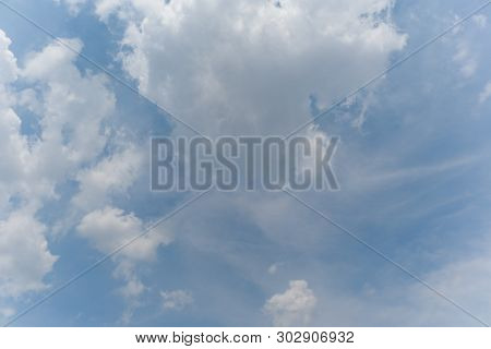 Beautiful Bright Blue Sky With White Fluffy Clouds On A Clear Sunny Day. Royalty High-quality Free S
